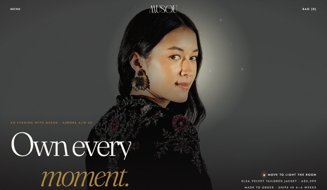 Candlelight: the embroidered Elsa jacket lit by a single light in a dark room